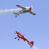 Father and son team of Bud and Ross Granley flying Russian Yak aircraft.